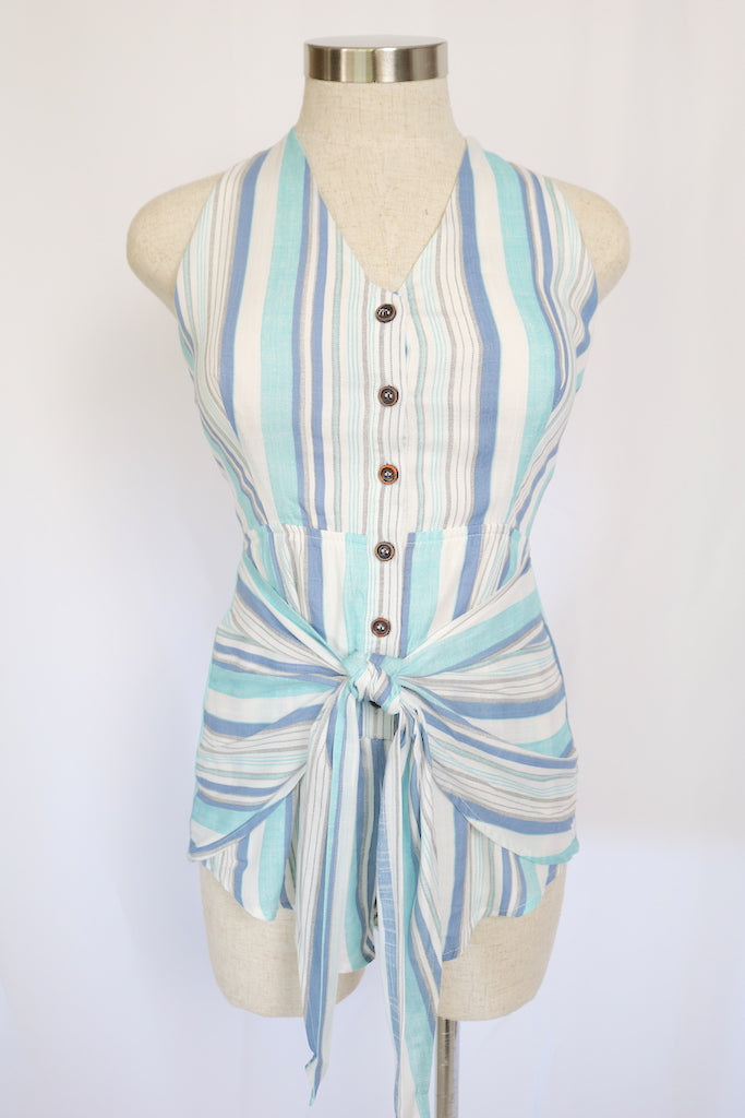 ~This beautifully designed romper was inspired by one thing - summer. Featuring an open back and button-down front. Pair with heels or sandals for a casual look.    ~Fabric: Rayon